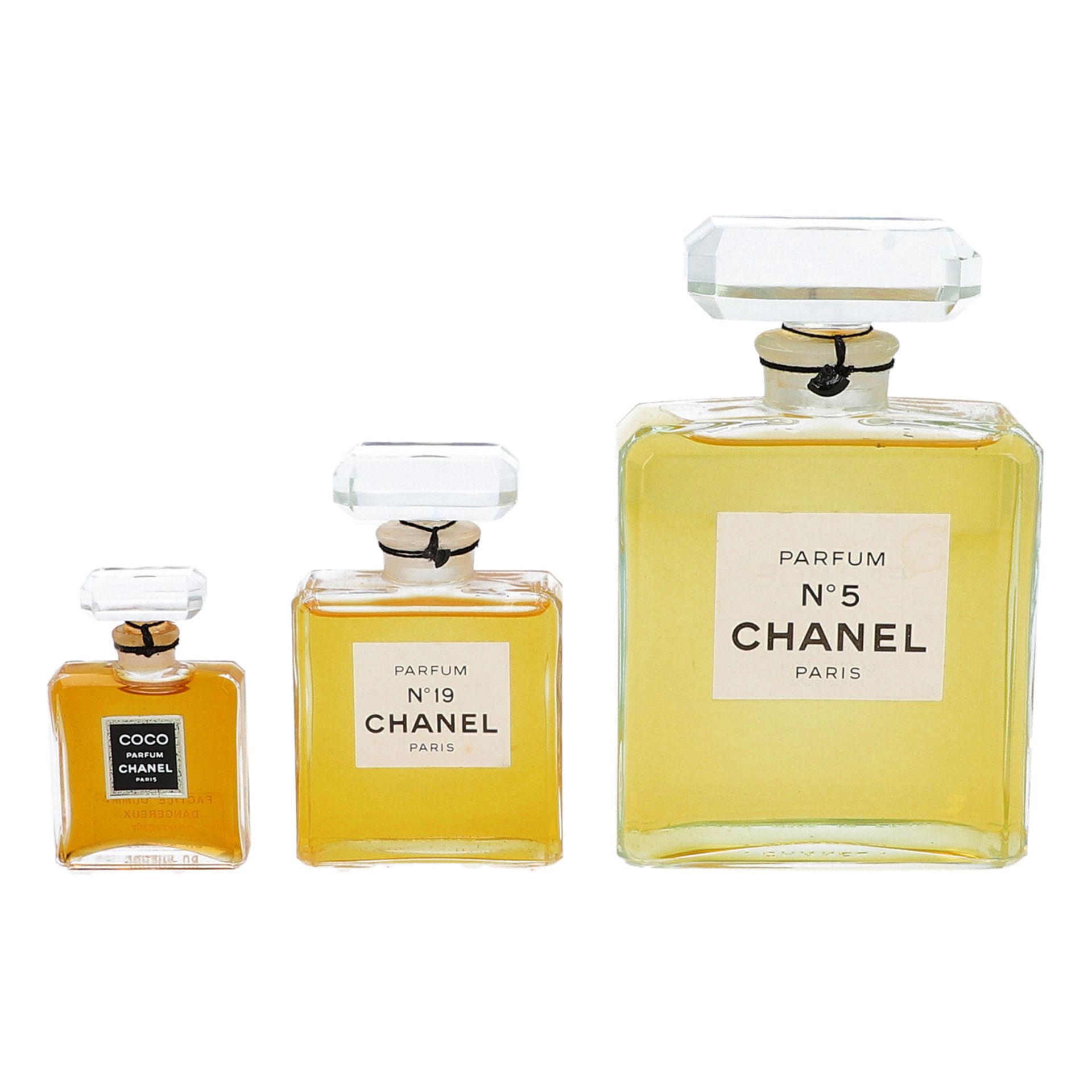 CHANEL VINTAGE Flacon-Konvolut.Chanel No. 5 (15cm), Chanel No. 19 (10cm) und Chanel Coco Flacon (