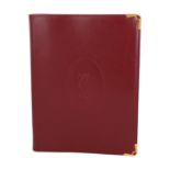 CARTIER VINTAGE Notizbuch.Glattleder in Bordeaux mit goldfarbenen Hardware-Ecken, Front mit