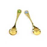 REVISED ESTIMATE: Two Georg Jensen silver gilt and enamel spoons with floral decoration