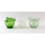 Three Austrian Art glass vases, a green iridescent three handled vase, with flared rim, on footed