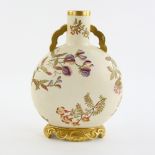 Royal Worcester moon flask decorated with flowers on shaped base, 30.5cm high,. Surface dirt and