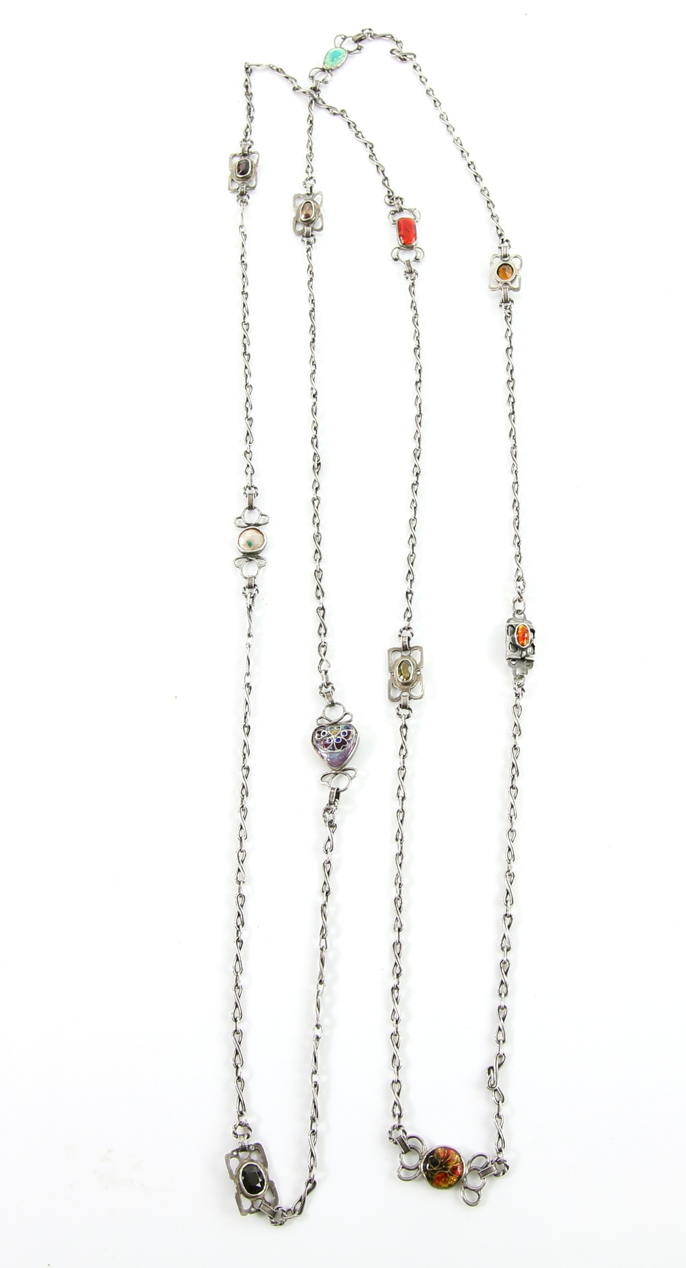 Arts & Crafts, silver long chain, hand-made twist design interspersed with plaques of enamel, the