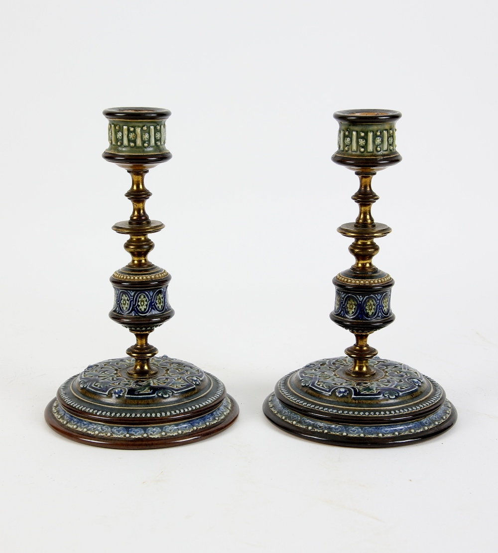 Pair of Doulton Lambeth stoneware and brass candlesticks on circular bases, incised monogram ES,