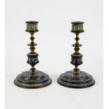 Pair of Doulton Lambeth stoneware and brass candlesticks on circular bases, incised monogram ES,