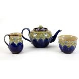 Royal Doulton teapot and cover, sugar bowl, 7.5cm high x 10cm diam, and milk jug, 10cm, in Art