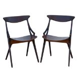 Arne Hovmand Olsen for Morgens Kold. a pair of sculptural chairs in teak with black coiled detail to