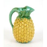 A Minton Majolica jug of pineapple form, impressed Minton, and raised registration lozenge, 19cm