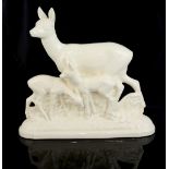 Sarreguemines white pottery figure of a deer with two fauns, 34cm.