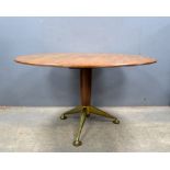 Andrew J Milne mid 20th C rosewood, dinning table, the circular, top on tapering column, and