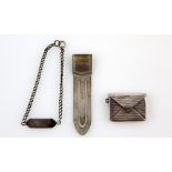 Silver envelope stamp case, bookmark and a silver bracelet, gross weight 12 gr. .