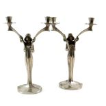 A pair of Art Nouveau style silvered metal candelabra in the form of maidens 33.5 cm .