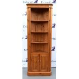 Pine free standing corner cabinet .