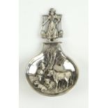 Silver caddy spoon, the bowl embossed with arable scene and the stem milk-maid, 6.5 cm long, 15