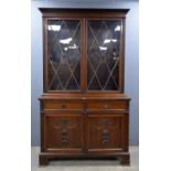 Early 20th century mahogany and glazed bookcase with two central drawers over two cupboards on