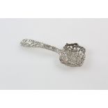 Silver bonbon spoon, with ornately chased and pierced bowl and stem, 13 cm long, 32 gr. .