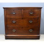 Mahogany chest of two short and three long drawers .