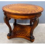 19th century style mahogany marquetry inlaid drum table raised on four lions paw legs to shaped base