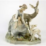 Lladro figure of a girl with dear and a faun..