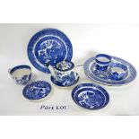 Blue and white transfer ware mainly Willow pattern, plus a saucer depicting a boy with a bow,