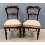 A set of six mahogany balloon back dining chairs. (6).