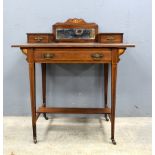 A mahogany cupboard and a writing desk. (2).