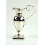 Silver cream jug, with flared rim and square foot, 15 cm high, 120 gr. .