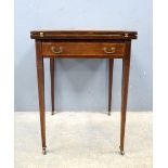 Early 20th century mahogany envelope card table, with single drawer on square tapering supports,.