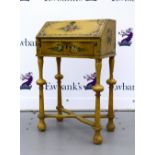 Continental painted bureau with floral decoration on turned supports and X-stretchered base,.