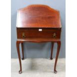 Mahogany bureau and a drinks trolley..