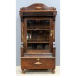 Walnut polyphon case, an oak barometer and an oak wall clock.