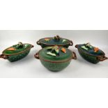 Tellurite Belgium four green glazed Majolica casserole dishes, the covers with moulded vegetables..