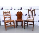 19th century mahogany hall chairs and two other chairs .