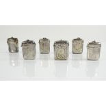 Six silver-plated vesta cases, two plain and four with engraved decoration, (6) .