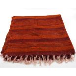 Moroccan Beni Ourain throw in rust and red 182cm x 126cm .