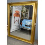 Gilt framed mirror .