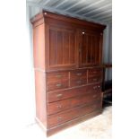 Early 20th century walnut linen press .