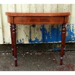 20th century mahogany and cross-banded card table on turned supports..