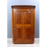 Oak wall mounted corner cupboard..