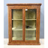 Early 20th century walnut display cabinet .