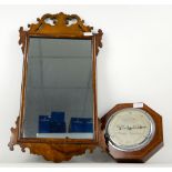 A fret framed mirror and a barometer by Short & Mason.