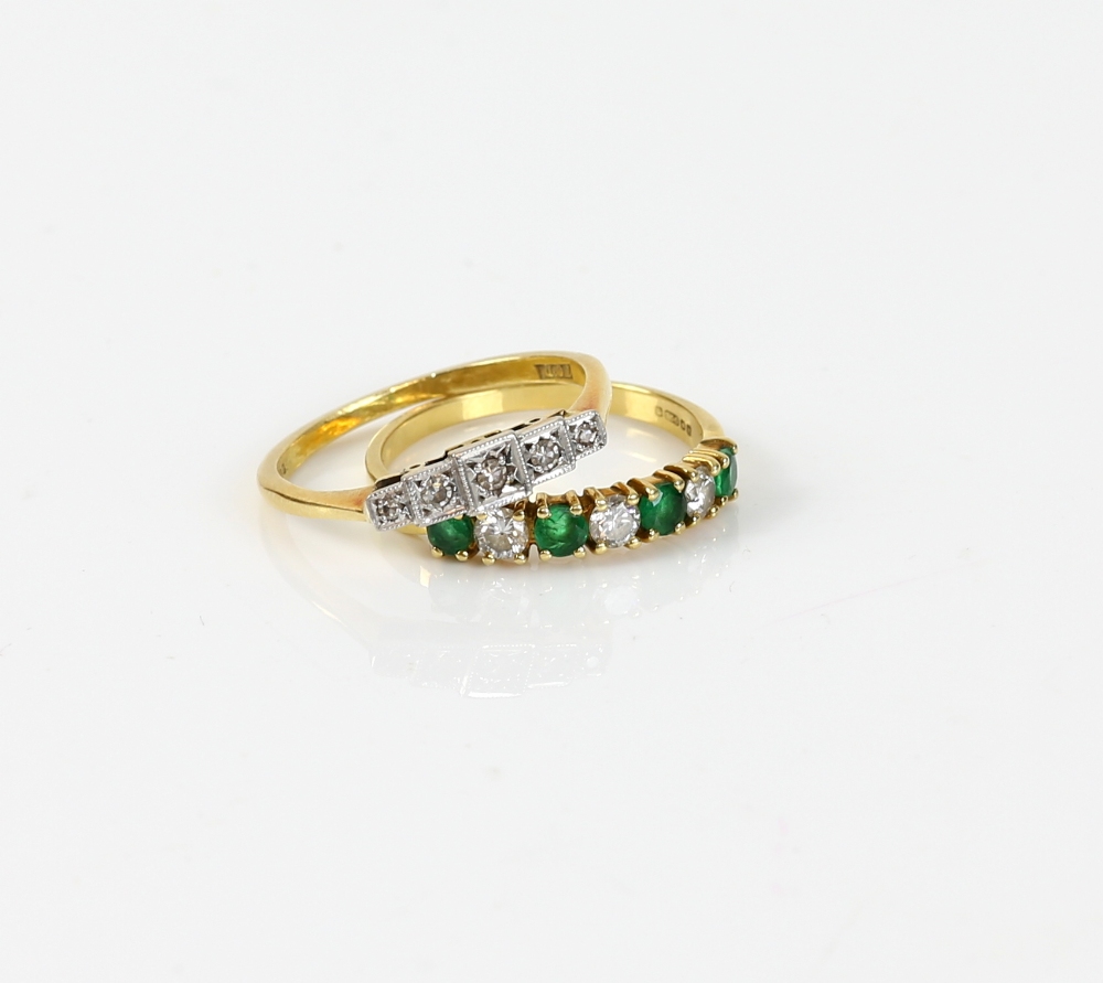 1960's diamond ring, set with five Swiss cut diamonds, and emerald and diamond ring, both mounted in