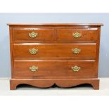 Mahogany chest of two short and three long drawers .