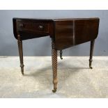 19th Century mahogany Pembroke table with a single drawer on spiral turned legs to brass casters