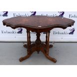 19th century walnut serpentine centre table.