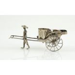 Chinese silver novelty open salt in the form of a man wheeling a cart, maker's mark W.O.Co, 11.5