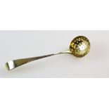 Small silver-gilt sifter spoon, 12 cm long, 9 gr. .