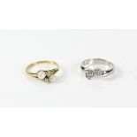 Gold dress ring, set with two cubic zirconia cluster, mounted in white metal stamped 18 ct, size O