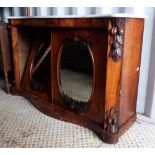 19th century serpentine mahogany two door credenza with marble top .