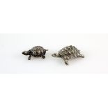 Two silver miniature tortoises, one stamped 800, 4.5 cm long, the other stamped 835, 4 cm long, 32