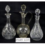 A quantity of cut glassware including decanters and bowls. (2 shelves).